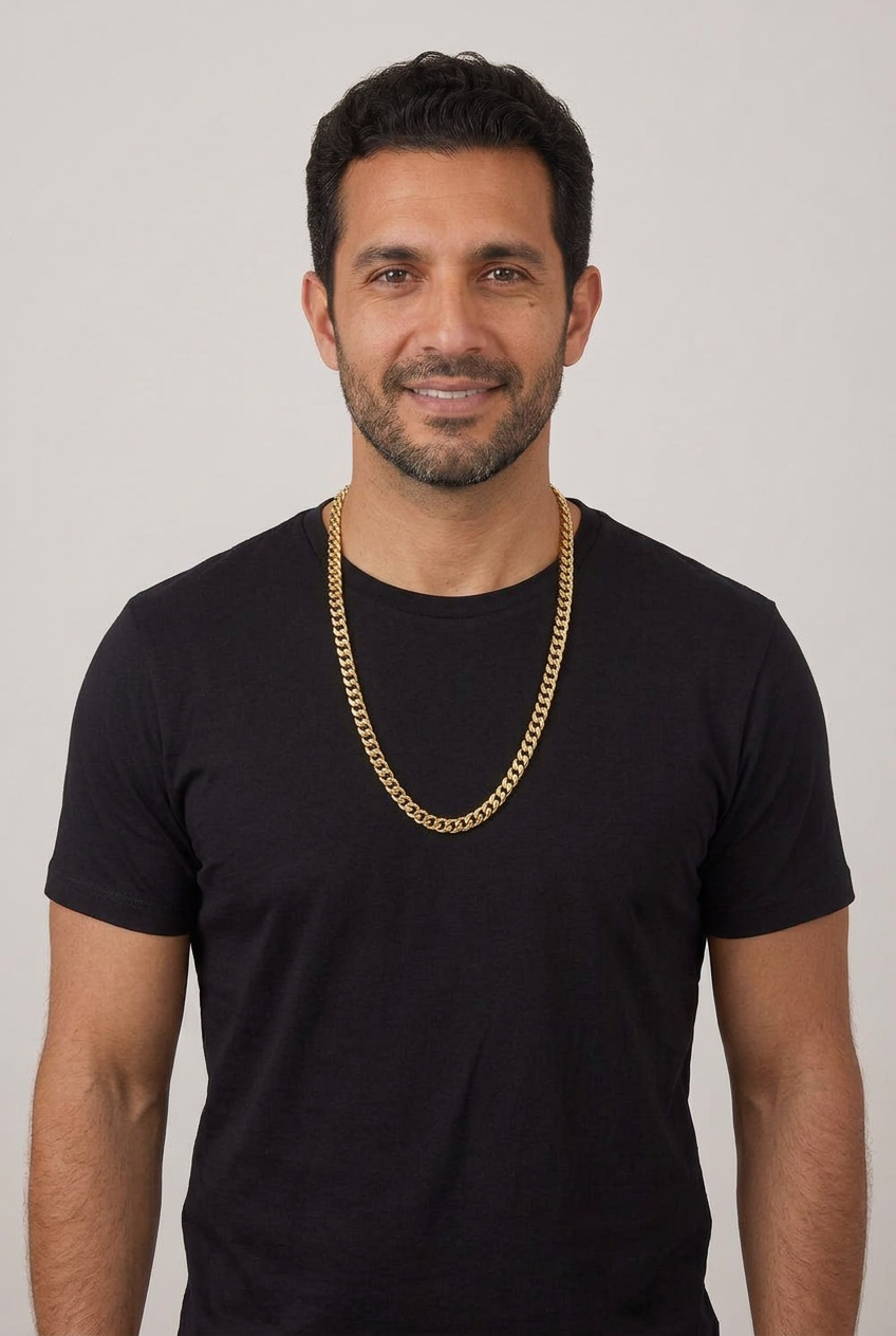 Model A wearing the yellow gold plated Cuban chain with a black T-shirt